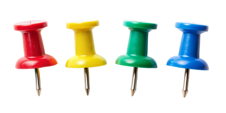 Four colorful push pins in red yellow green and blue arranged in a row
