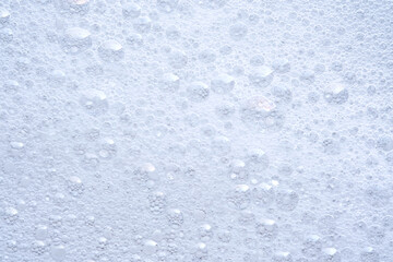 Thick soap foam with bubbles.