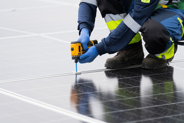Solar panel rooftop, Rooftop solar power. Engineer or technicians maintaining and repairing solar power systems on rooftop of building. Hands of engineer install solar cell on rooftop