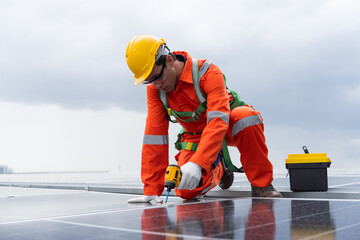 Solar panel rooftop, Rooftop solar power. Engineer or technicians maintaining and repairing solar power systems on rooftop of building. Male engineer install solar cell on rooftop