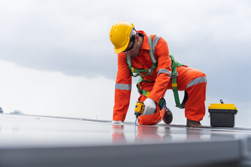 Solar panel rooftop, Rooftop solar power. Engineer or technicians maintaining and repairing solar power systems on rooftop of building. Male engineer install solar cell on rooftop