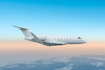White luxury bizjet flying in the air above the clouds
