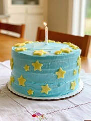 A vibrant blue cake adorned with playful yellow star decorations and a lit candle stands proudly on a table. This delightful dessert is ready to bring joy to a special celebration.