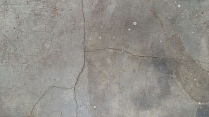 Old grunge concrete surface with weathered cement texture and rough stone patterns, ideal for...