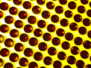 seamless pattern with yellow dots, circle symmetry polkadot round in yellow and brown colored 