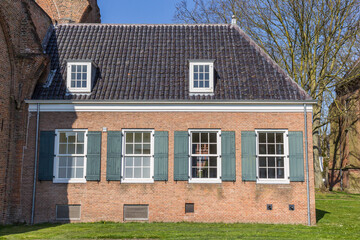Widows with shutters on the Maartens church in Tiel, Netherlands