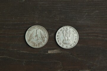 Coin half rupee on wooden table