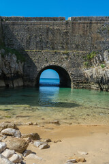 Stunning Stone Archway and Clear Waters in Peniche, Portugal