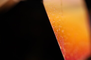 Orange coloured liquid surface, fluid effect, bright chemistry, one line