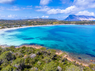 Aerial view of Cala Brandinchi coastline on a cloudy day