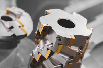 Industrial metalworking concept, milling cutter, metal cutter close up CNC cutters for metal. industry metal processing concept background © Aleksandr Matveev