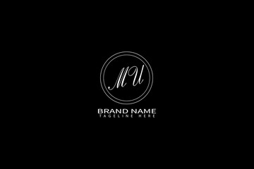 Fototapeta premium Minimal MU Letter Monogram Logo on Black Background