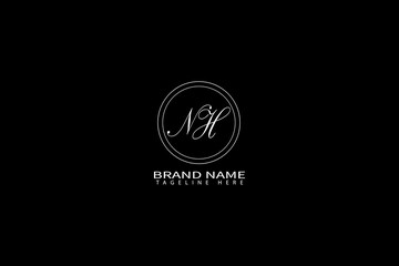 Fototapeta premium Elegant NH Monogram Logo with Brand Name and Tagline