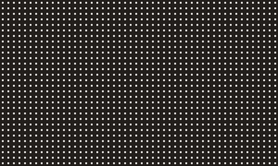 A repeating pattern of small white dots evenly spaced on a solid black background creating a minimalist graphic design