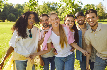 Young friends, diverse group of young people together fun, posing for team photo enjoying happy and...