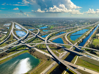 American highway junction with fast driving vehicles in Miami, Florida. USA urban transportation infrastructure