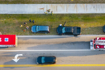 Car accident on city street in Florida. Result of distracted driving and speeding. Emergency...