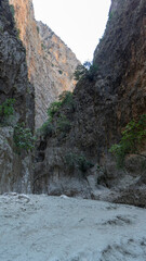 Deepest narrow stone canyon Saklikent in national park in Mugla Province in southwestern Turkey. Vertical image