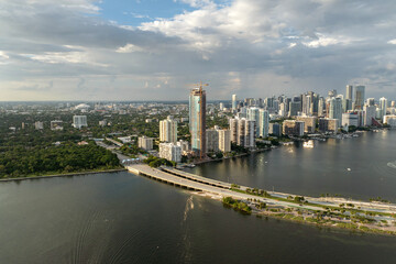 Fototapeta premium View from above of waterfront buildings in downtown district of Miami, Florida, USA. American city with business financial district