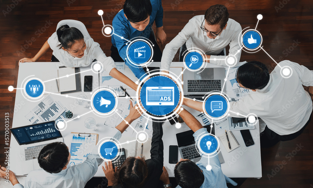 Aufkleber A diverse team collaborates in a modern office, utilizing technology and data analysis to develop innovative marketing strategies and enhance business performance. Amity