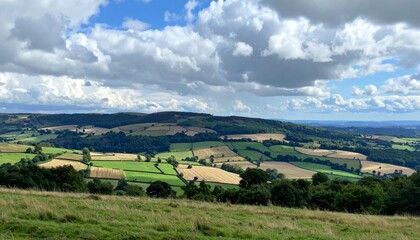Scenic Landscape with Rolling Hills and Dramatic Cloudy Sky