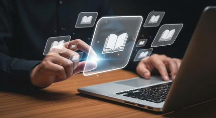Person using laptop with floating book icons representing digital learning and online education