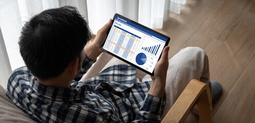 Spreadsheet document information financial startup concept. data and graphs in spreadsheet...