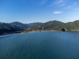 Aerial view of beautiful tropical rainforest beach from the ocean