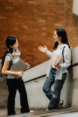 Students Conversing on Staircase