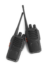 Two walkie talkies on white background, top view. Police equipment