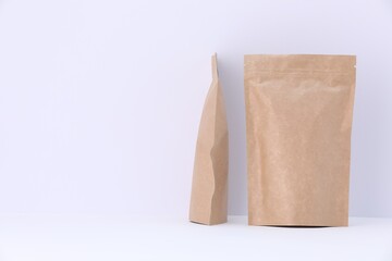 Zipper stand-up pouches on white background. Mockup for design