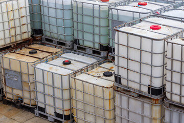 Large collection of industrial liquid containers