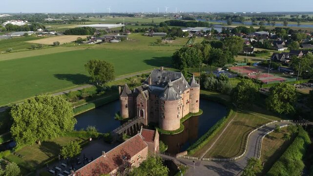 Ammersoyen Castle in Ammerzoden, The Netherlands. Ammersoyen Castle is one of the best preserved medieval castles in the Netherlands. Aerial video.