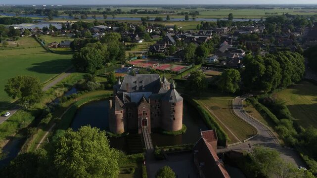 Ammersoyen Castle in Ammerzoden, The Netherlands. Ammersoyen Castle is one of the best preserved medieval castles in the Netherlands. Aerial video.