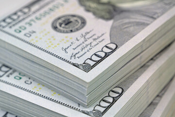 Thirty thousand of real american dollars. Three packs of one hundred dollars