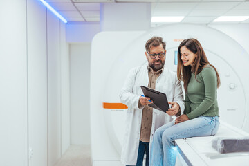 Fototapeta premium Doctor Explaining Results to Patient in Medical Imaging Room Setting