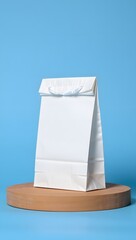 White paper bag mockup template on display stand for product presentation branding
