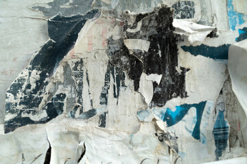 Art collage of a ripped and torn street poster background