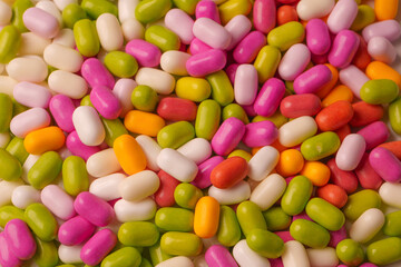Sweet multicolored candies isolated on white background.