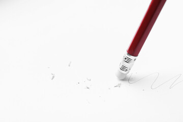 Using pencil with eraser on white background, closeup. Space for text