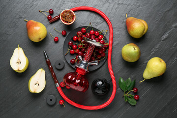Hookah and fresh fruits on black table, flat lay