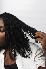 micro twists protective style on 4c afro hair,frizzy mini twists on curly hair, long micro twists with curly ends
