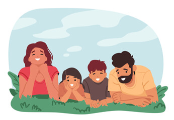 Happy family lying together on meadow grass enjoying peaceful moments of spending time outdoors