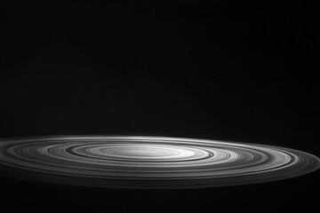 Fototapeta premium Abstract grayscale image depicting concentric circles resembling a galaxy or planetary rings against a transparent background.