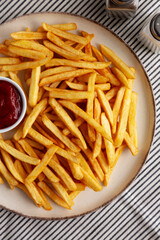 Homemade Golden French Fries with Ketchup, top view. Close-up.