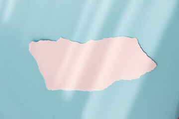 piece of paper on a blue background