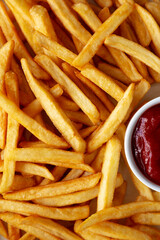 Homemade Golden French Fries with Ketchup, top view. Close-up.