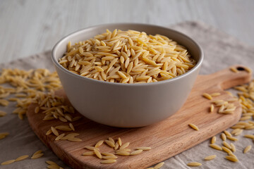 Organic Dried Orzo Pasta in a Bowl, side view.