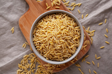 Organic Dried Orzo Pasta in a Bowl, top view.