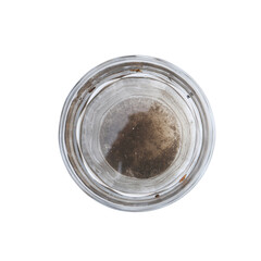 Glass with dirty water isolated on white, top view